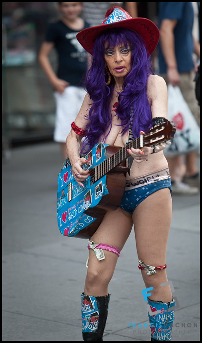 New York City Two Naked Cowgirls In Bikini Play Guitar On 