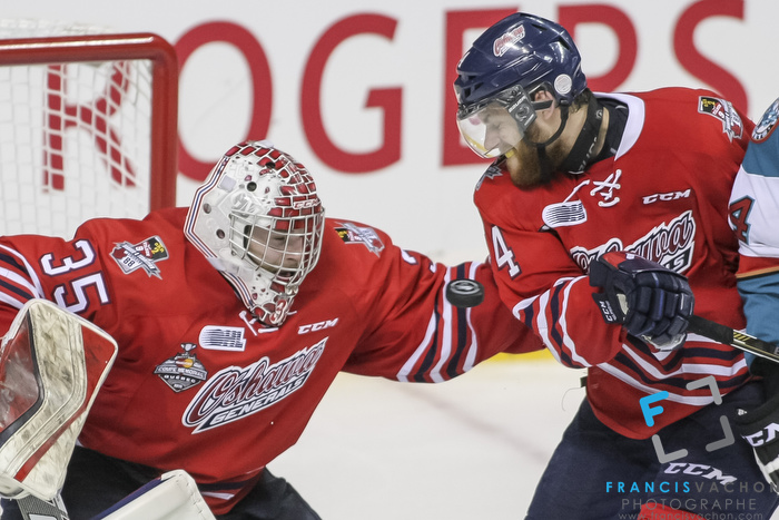 Oshawa Generals' goalkeeper Ken Appleby eyes the puck to make a save during Memorial Cup finals action in Quebec City  on Sunday May 31, 2015. Francis Vachon/Postmedia Network
