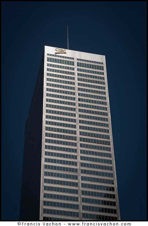 CIBC logo is seen on top of their headquarters in Toronto financial district